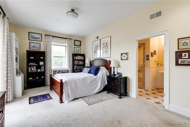 1350 Westwood Ave Unit 406, Richmond, VA 23227 - bedroom featuring carpet flooring, ensuite bathroom, and baseboards