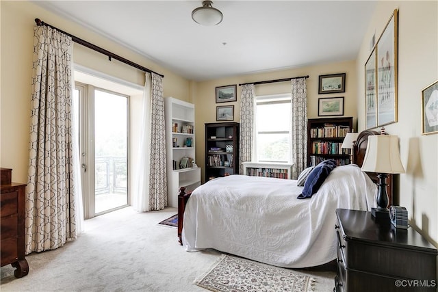 1350 Westwood Ave Unit 406, Richmond, VA 23227 - bedroom with carpet flooring and access to exterior