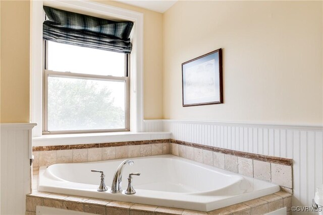 1350 Westwood Ave Unit 406, Richmond, VA 23227 - bathroom featuring a bath and healthy amount of natural light