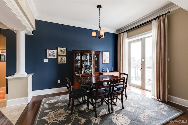 1350 Westwood Ave Unit 406, Richmond, VA 23227 - dining area with ornate columns, crown molding, baseboards, a chandelier, and wood finished floors