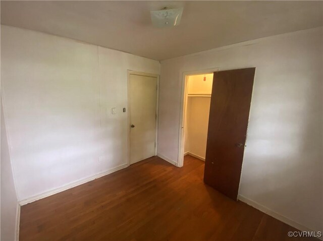 205 N Beech Ave, Henrico, VA 23075 - unfurnished bedroom with wood finished floors, a closet, and baseboards