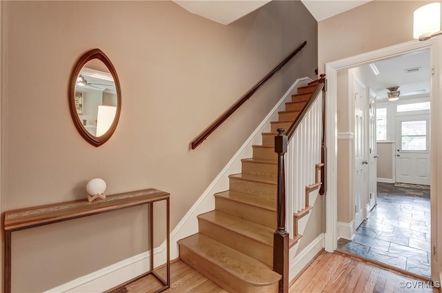 3429 Hanover Ave, Richmond, VA 23221 - staircase featuring baseboards, ceiling fan, and wood finished floors