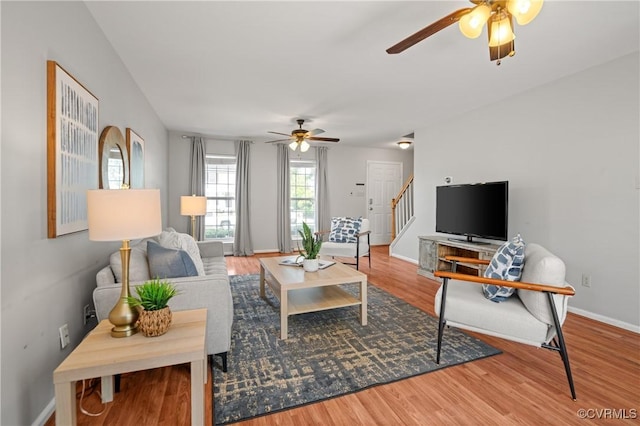 1117 Lees Crossing Ct, Glen Allen, VA 23059 - living room featuring a ceiling fan, wood finished floors, stairs, and baseboards