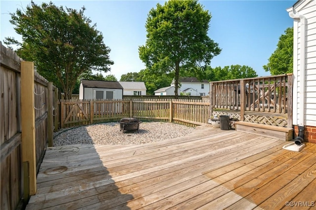 1117 Lees Crossing Ct, Glen Allen, VA 23059 - wooden terrace with a fire pit and a fenced backyard