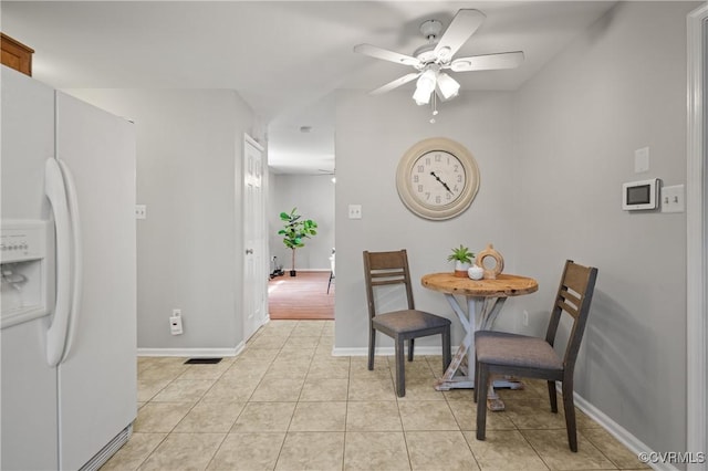 1117 Lees Crossing Ct, Glen Allen, VA 23059 - dining area with ceiling fan, light tile patterned floors, and baseboards