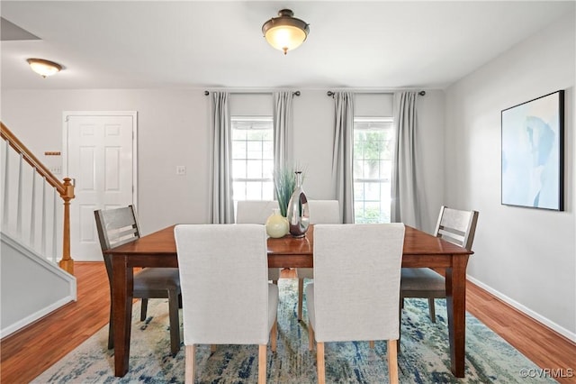 1117 Lees Crossing Ct, Glen Allen, VA 23059 - dining area with wood finished floors, stairs, and baseboards