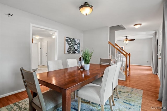 1117 Lees Crossing Ct, Glen Allen, VA 23059 - dining space with ceiling fan, stairway, light wood finished floors, and baseboards