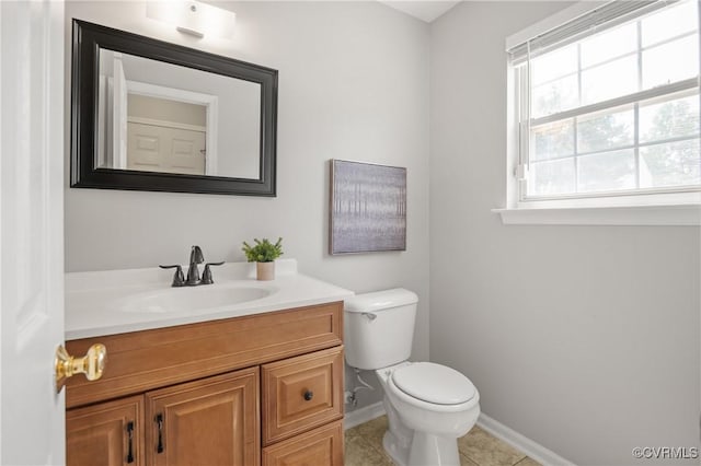 1117 Lees Crossing Ct, Glen Allen, VA 23059 - half bath featuring toilet, baseboards, vanity, and tile patterned floors