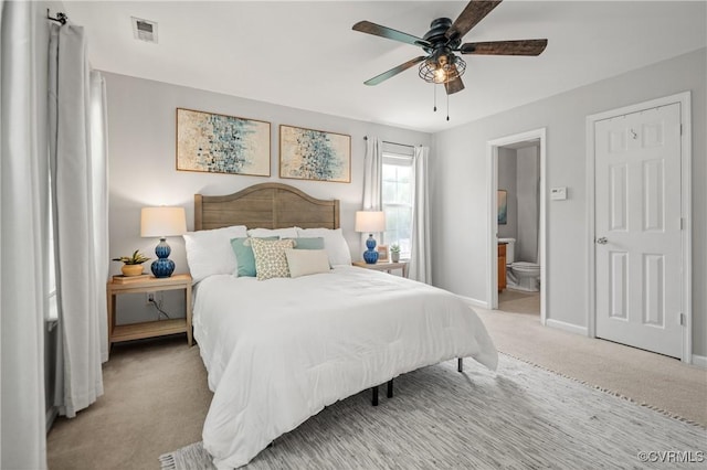 1117 Lees Crossing Ct, Glen Allen, VA 23059 - bedroom with light colored carpet, baseboards, ensuite bath, and a ceiling fan