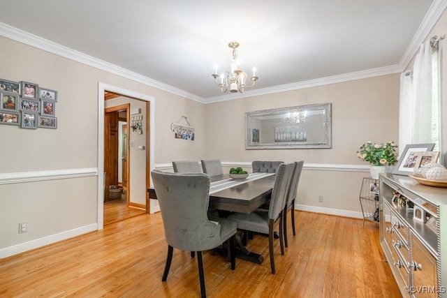 12601 W Patrick Henry Rd, Ashland, VA 23005 - dining room with a chandelier, ornamental molding, light wood-type flooring, and baseboards