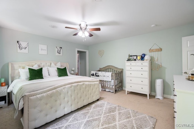 12601 W Patrick Henry Rd, Ashland, VA 23005 - bedroom featuring light carpet, ceiling fan, and baseboards