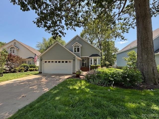 12513 Caitlin Cir, Henrico, VA 23233 - traditional-style house featuring a garage, driveway, and a front yard