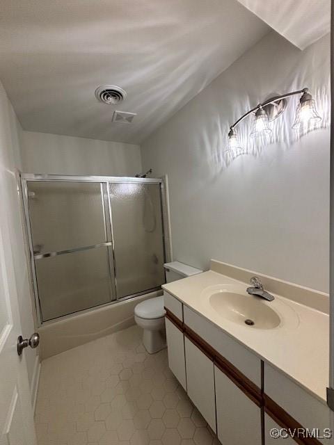 12513 Caitlin Cir, Henrico, VA 23233 - full bath with tile patterned floors, vanity, and combined bath / shower with glass door