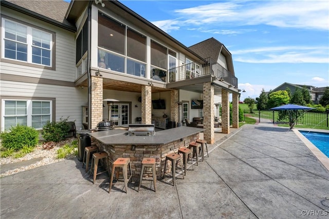 3397 Manor Oaks Dr, Powhatan, VA 23139 - back of property featuring a patio area, a sunroom, and a balcony