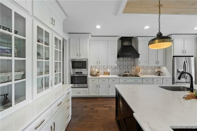 3397 Manor Oaks Dr, Powhatan, VA 23139 - kitchen with appliances with stainless steel finishes, wall chimney range hood, recessed lighting, decorative light fixtures, and tasteful backsplash