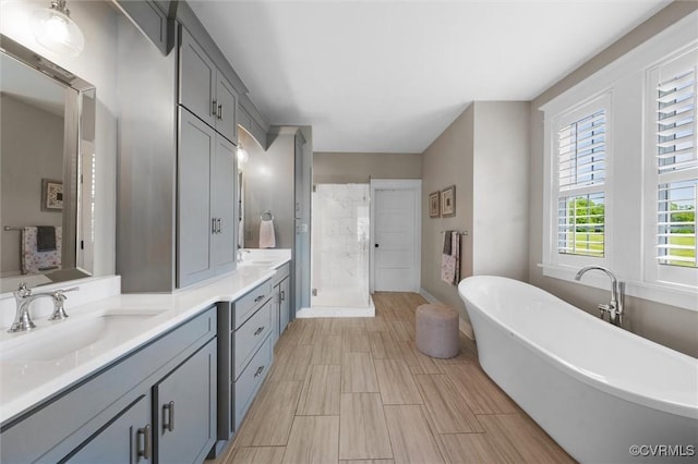 3397 Manor Oaks Dr, Powhatan, VA 23139 - full bath with a marble finish shower, a freestanding tub, and double vanity