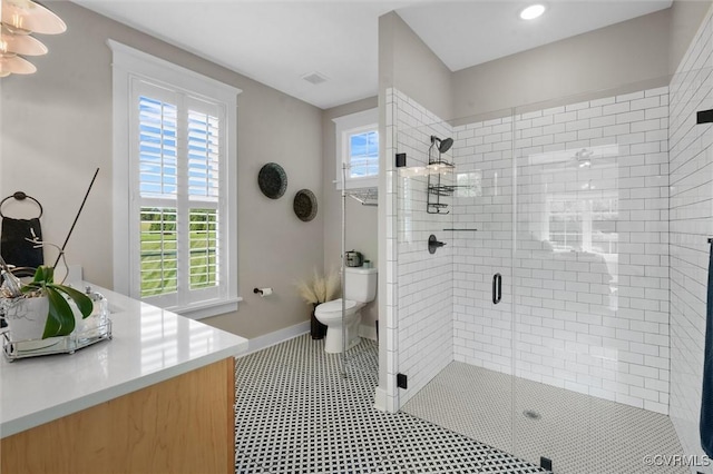 3397 Manor Oaks Dr, Powhatan, VA 23139 - bathroom with a shower stall, vanity, ceiling fan, and recessed lighting