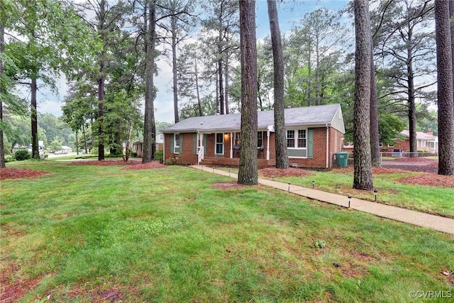 603 Pleasant St, Henrico, VA 23075 - ranch-style house with brick siding and a front lawn