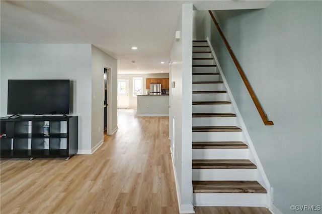 3107 Q St, Richmond, VA 23223 - staircase with wood finished floors and recessed lighting