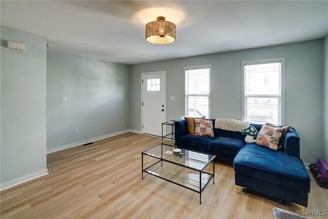 3107 Q St, Richmond, VA 23223 - living area with light wood-type flooring and baseboards