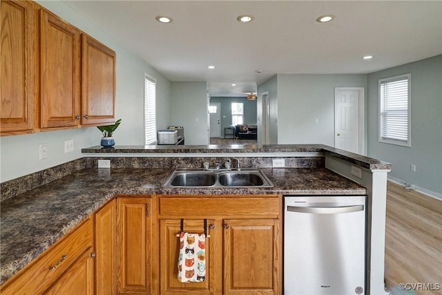 3107 Q St, Richmond, VA 23223 - kitchen featuring dishwasher, brown cabinetry, recessed lighting, light wood-style flooring, and a peninsula