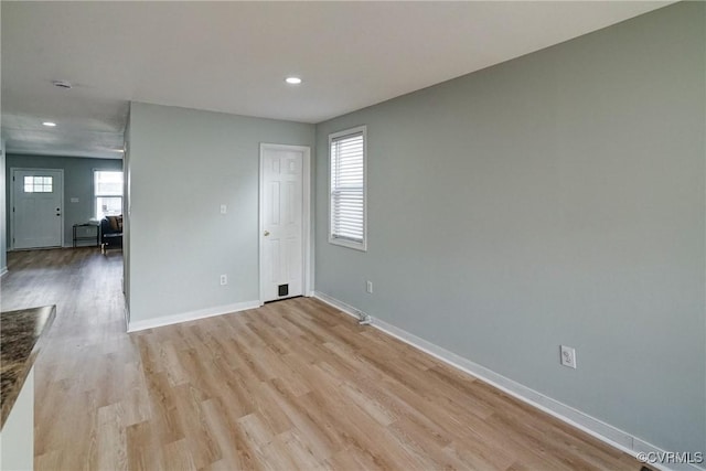 3107 Q St, Richmond, VA 23223 - empty room with light wood-style floors, healthy amount of natural light, and recessed lighting