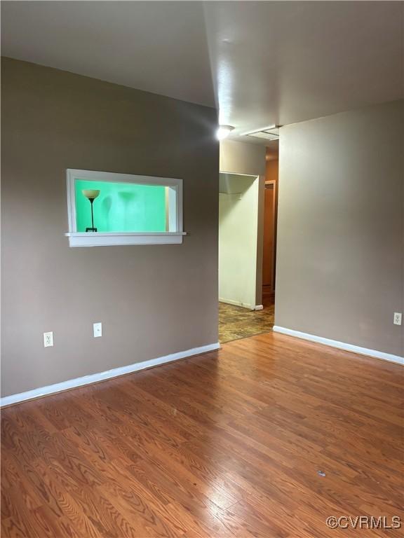 609 Carter St, Petersburg, VA 23803 - unfurnished room featuring wood finished floors and baseboards