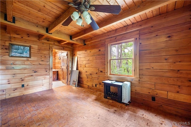 10 N River Ct, Cartersville, VA 23027 - spare room with wood ceiling with exposed beams, a ceiling fan, wooden walls, and brick patterned floors