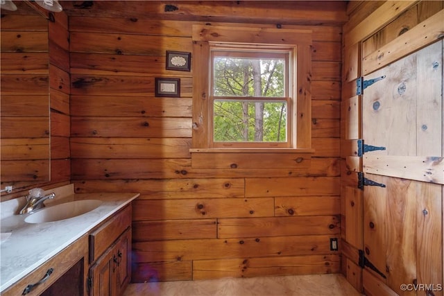 10 N River Ct, Cartersville, VA 23027 - bathroom featuring vanity and wood walls