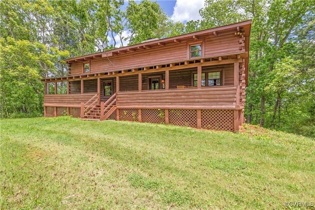 10 N River Ct, Cartersville, VA 23027 - rear view of house featuring a lawn and log siding