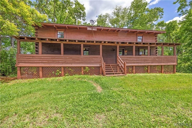 10 N River Ct, Cartersville, VA 23027 - back of property with log exterior and a lawn