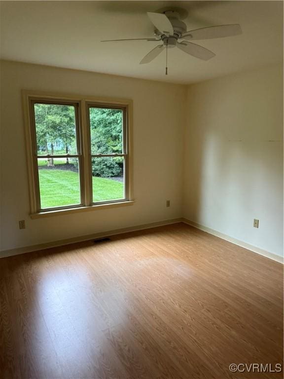 12605 Long Branch Ct, Chesterfield, VA 23832 - unfurnished room featuring wood finished floors, a ceiling fan, and baseboards