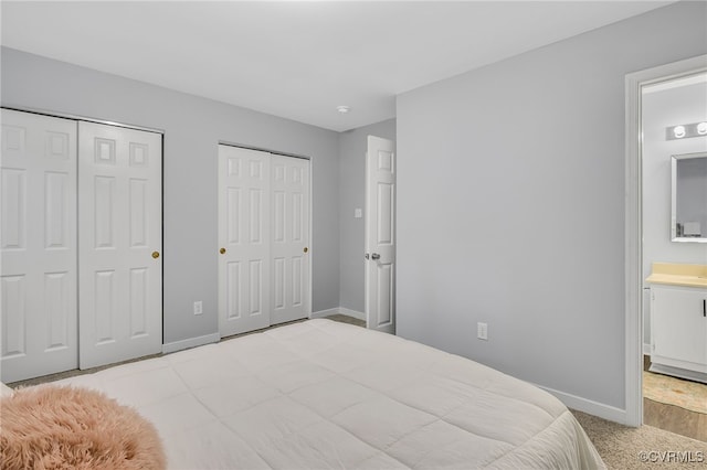 1417 Sycamore Mews Cir, Midlothian, VA 23113 - bedroom with multiple closets, connected bathroom, and carpet floors