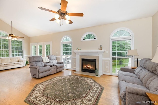 160 Walnut Ridge Dr, Stafford, VA 22556 - living room with ceiling fan, light wood-type flooring, healthy amount of natural light, a fireplace with flush hearth, and vaulted ceiling