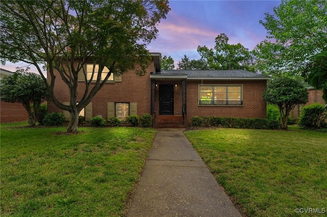 2503 Brook Rd, Richmond, VA 23220 - split level home featuring a front lawn and brick siding