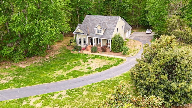 1905 Hope Meadow Way, Powhatan, VA 23139 - view of front of house with asphalt driveway, a front yard, and covered porch