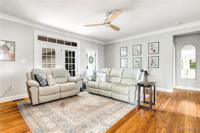 1905 Hope Meadow Way, Powhatan, VA 23139 - living room featuring ceiling fan, wood finished floors, baseboards, ornamental molding, and french doors