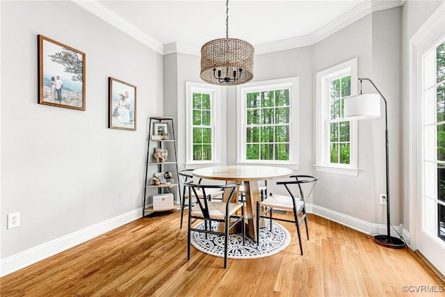 1905 Hope Meadow Way, Powhatan, VA 23139 - dining space featuring baseboards, light wood finished floors, plenty of natural light, a chandelier, and crown molding