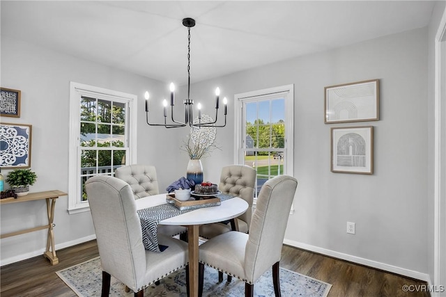 2505 Winston Ct, Glen Allen, VA 23060 - dining room featuring a chandelier, dark wood-style flooring, plenty of natural light, and baseboards