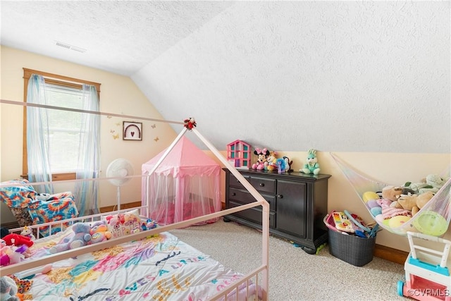 17 Brougham Rd, Fluvanna, VA 22963 - playroom featuring a textured ceiling, lofted ceiling, carpet floors, and baseboards