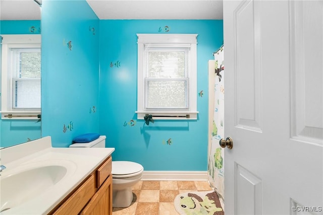 17 Brougham Rd, Fluvanna, VA 22963 - bathroom with toilet, vanity, baseboards, and a shower with curtain