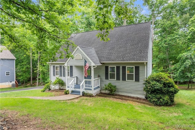 17 Brougham Rd, Fluvanna, VA 22963 - cape cod house featuring a shingled roof, a front yard, and central AC