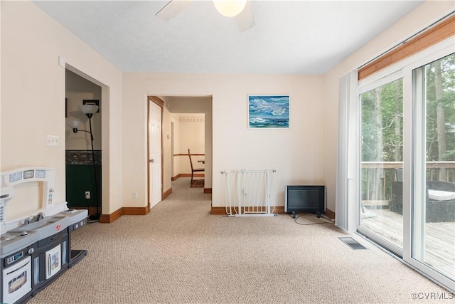 17 Brougham Rd, Fluvanna, VA 22963 - bedroom with light colored carpet, access to outside, baseboards, and ceiling fan