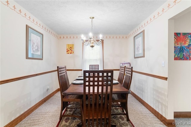 17 Brougham Rd, Fluvanna, VA 22963 - carpeted dining room with a chandelier, a textured ceiling, and baseboards