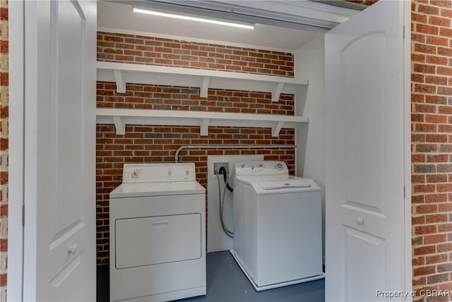 449 Martha Lee Dr, New Market, VA 23666 - washroom with washer and dryer and brick wall