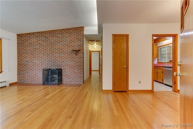 449 Martha Lee Dr, New Market, VA 23666 - unfurnished living room with light wood finished floors, a fireplace, baseboards, and a sink