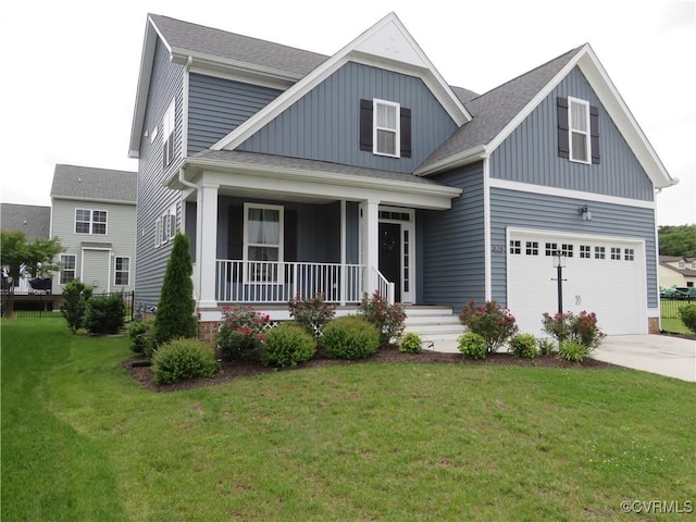 7617 Royal Crown Ct, Mechanicsville, VA 23116 - view of front of house featuring a garage, covered porch, concrete driveway, a front yard, and board and batten siding