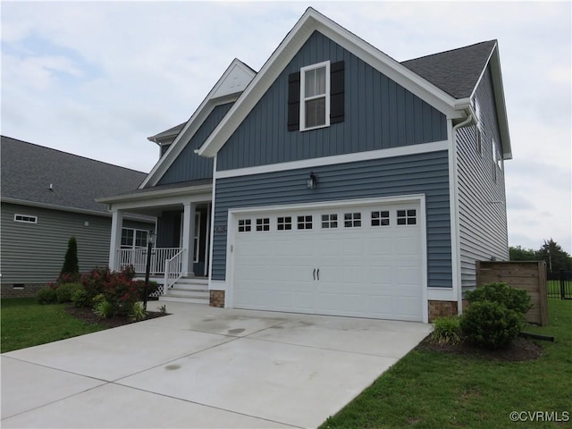 7617 Royal Crown Ct, Mechanicsville, VA 23116 - craftsman house featuring a porch, concrete driveway, a garage, and stone siding
