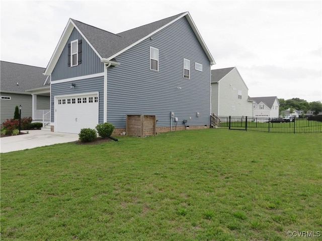 7617 Royal Crown Ct, Mechanicsville, VA 23116 - view of side of property featuring a garage, concrete driveway, and board and batten siding
