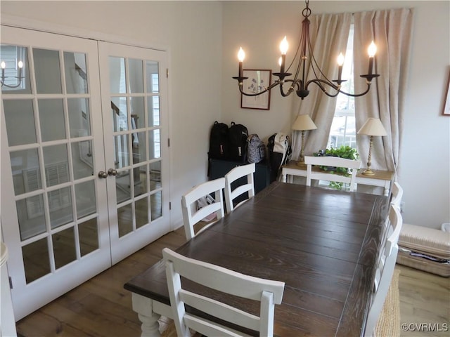 7617 Royal Crown Ct, Mechanicsville, VA 23116 - dining space featuring a chandelier, french doors, and wood finished floors